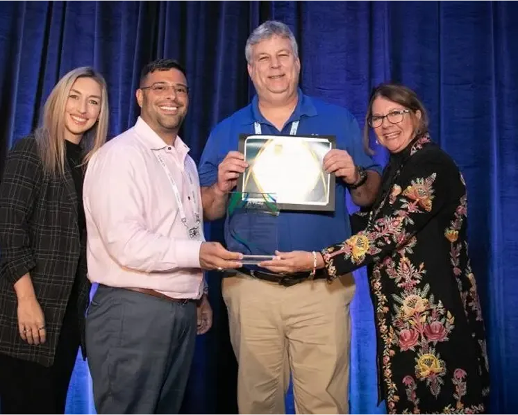 Man receiving an award